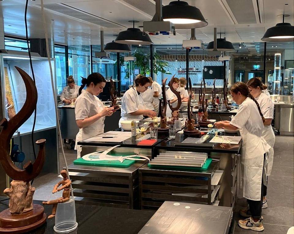 Students in a class at Chocolate Academy™ Center in Zurich perfect their chocolate sculptures