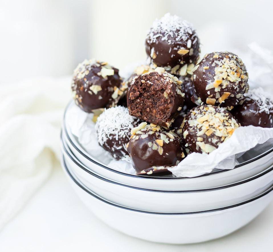 Chocolate truffles with a nubby texture, rolled in nuts