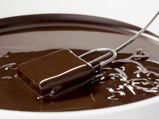 coating dark chocolate bonbon