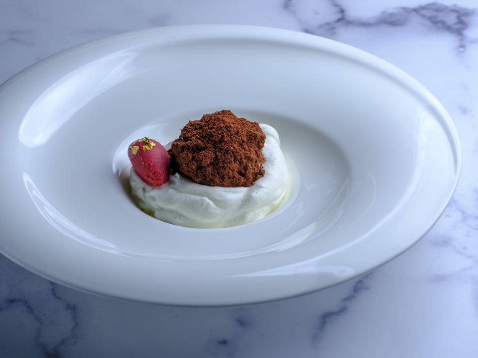 The Menu (2022) In the climax, the s'mores course is inspired by the 3  Michelin Starred restaurant Alinea's final dessert course, where chocolate  and confectionery are “painted” directly on the table as