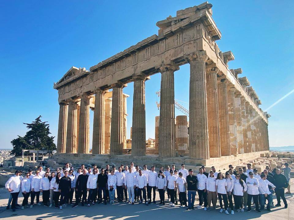 Chocolate Academy™ Chefs pose in front of the Parthenon