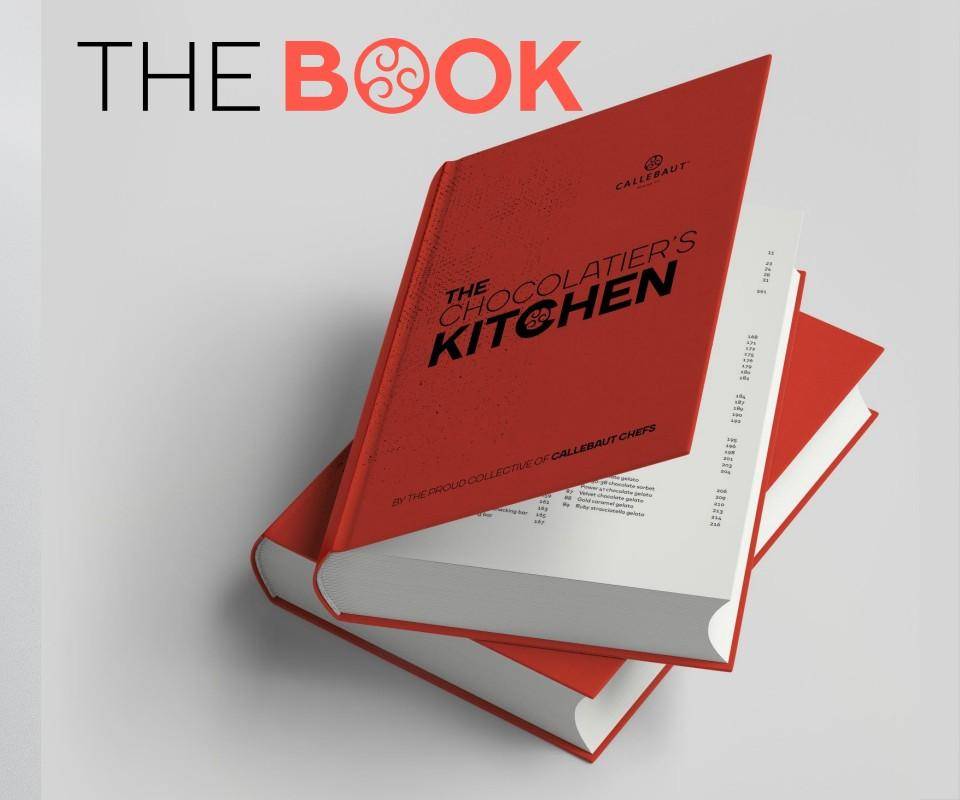Two copies of The Chocolatier's Kitchen, one stacked on the other