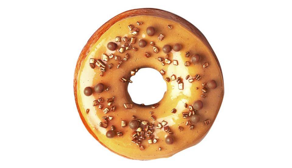 A gold-glazed donut with gold shimmers and milk chocolate Crispearls™