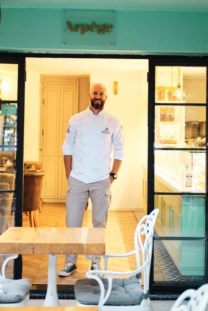 Chef Metin outside his shop