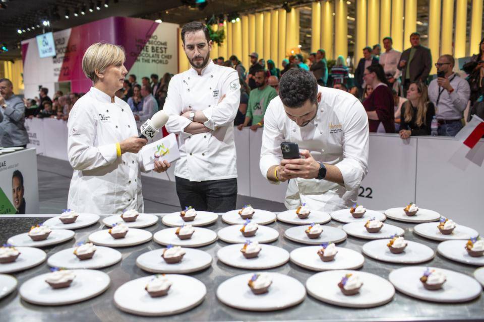 Chefs observe one of the competitor's entries at World Chocolate Masters