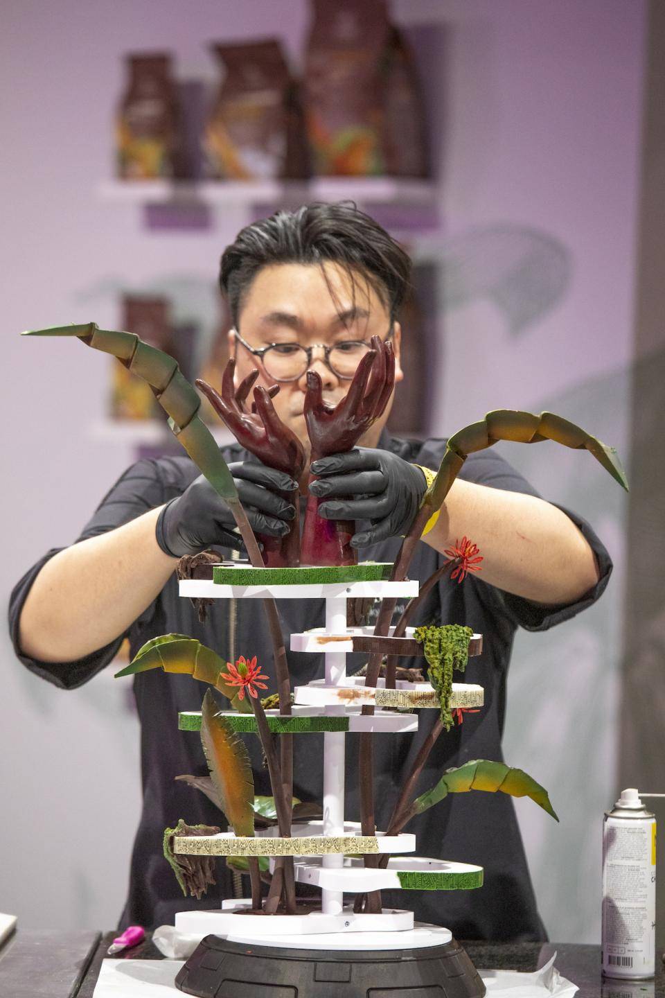 Chef Jacky Lung assembles his sculpture at the World Chocolate Masters Final