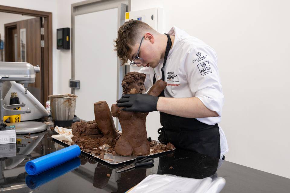 Jr Chocolate Masters Contestant James Robinson working on his chocolate sculpture