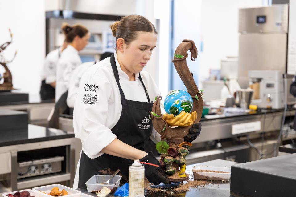 Jr Chocolate Masters Contestant Sarah Williams working on her chocolate sculpture