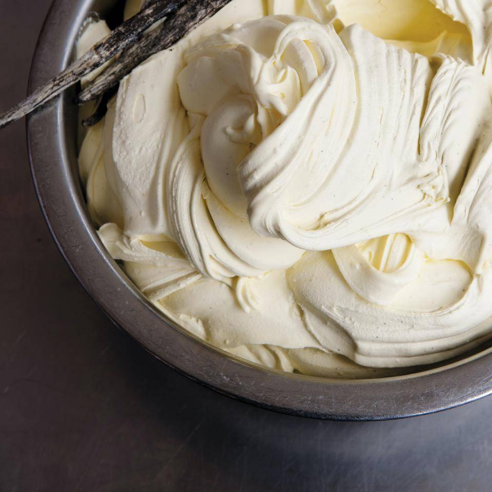 A large bowl of vanilla soft serve ice cream