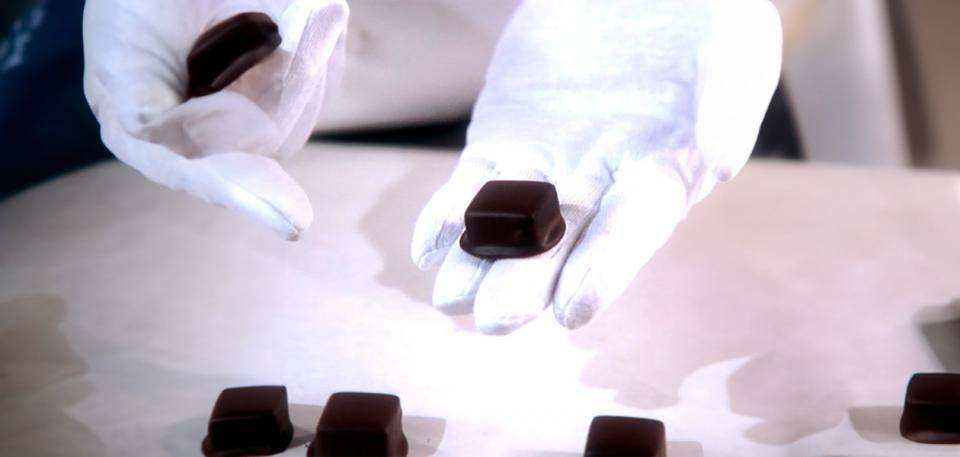 foot at the base of the chocolates