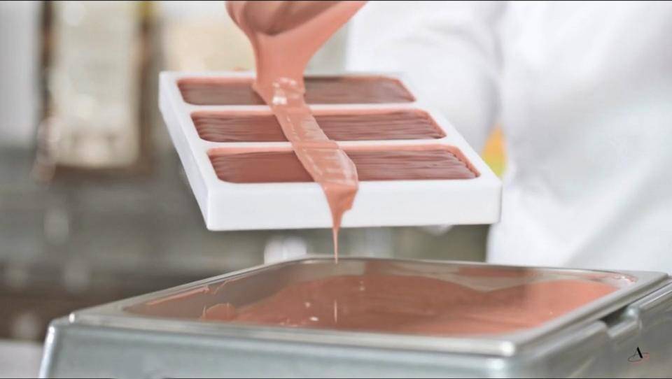 A Chef casts tablets using crystallized Ruby Chocolate