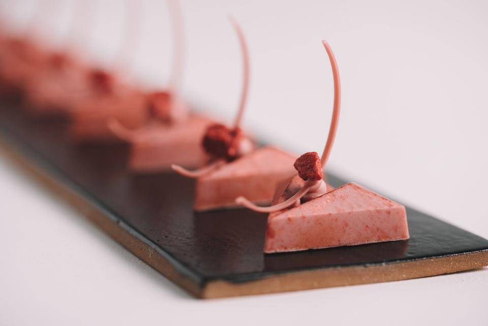 Basil, lime, and Ruby Chocolate molded bonbons by Chef Ryan Stevenson