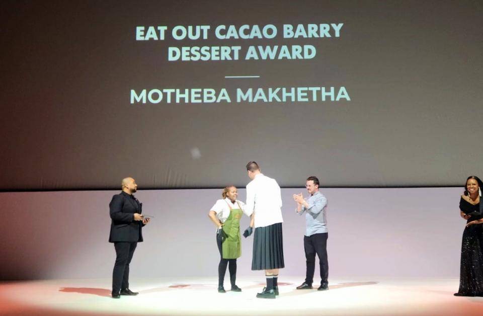 Motheba Makhetha receiving her award at the Eat Out South Africa Awards ceremony