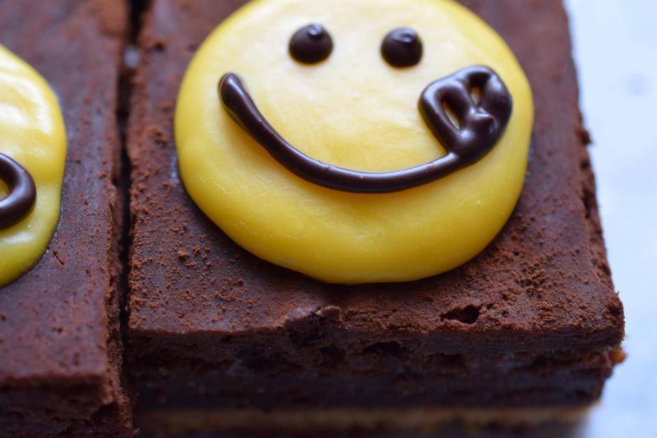 Smiley brownies with mango ganache