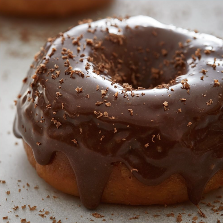 A classic donut with a milk chocolate glaze