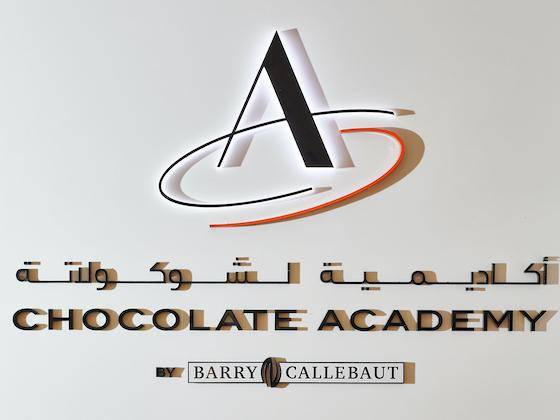 The Dubai Chocolate Academy™ Center's Logo on the building