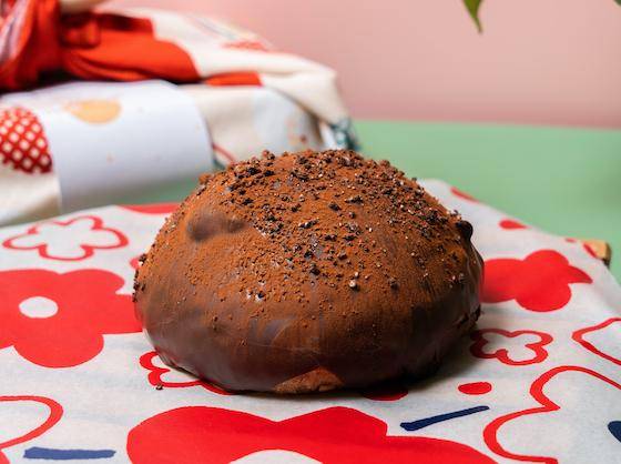 A cocoa-powder-dusted chocolate bun aka "Dirty Bread" or Zang zang bao