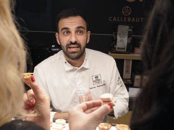 Chocolate Ambassador Chef Spyros Pediaditakis talks with customers