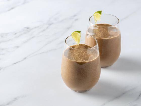 Chocolate Cocktails garnished with lime wedges