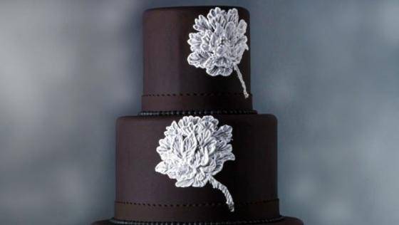 A cake with royal icing stencils